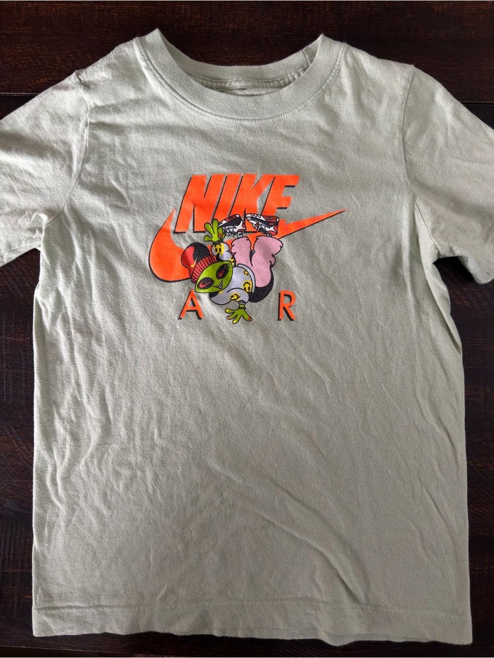 Nike Light Green Kids Short Sleeve T-Shirt with Neon Orange Logo and Graphic